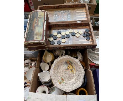 A box of mixed pottery including jugs, teapots, Portmeirion, Royal Winton Beehive, studio pottery etc. Also includes a backga