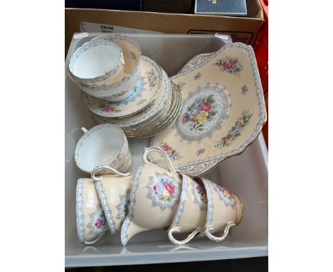 A Shelley Crochet tea set 21 pieces.Condition:- Handle missing from one cup, crack in bowl, no sign of any other damage or re