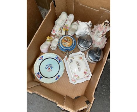 A mixed lot of ceramics including a German bisque figure of a girl, ceramic shoes, Samuri lidded vase, German figurine, etc. 