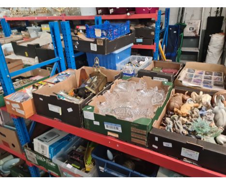 A box of ornaments, a box of glassware, a box of metalware, platedware, brass, a metronome and kitchen scales with weights, a