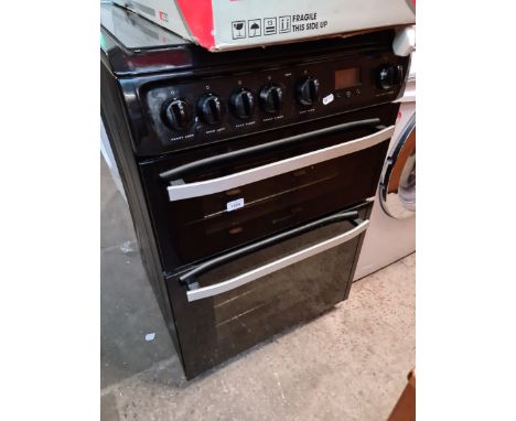 A Hotpoint gas oven with four ring hob. 