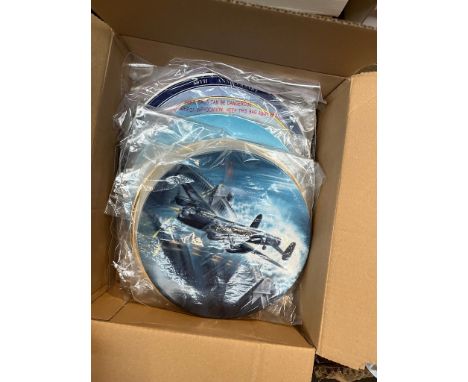 A group of eight collectors plates depicting WWII aircraft including Wedgwood, Royal Doulton and Royal Worcester, with wall h