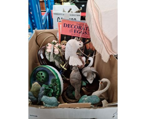 A mixed lot including animal figures, decorative table lamp modelled as a bird, books, etc.