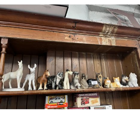 12 animal figures by Poole, Royal Worcester etc 