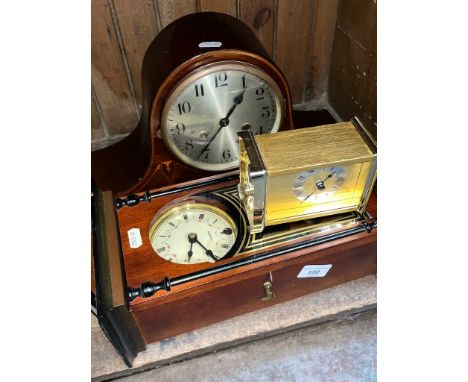 A 31 day wall clock, an Edwardian inlaid mahogany mantle clock and a brass carriage clock. 
