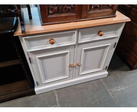 A painted pine side cabinet. 