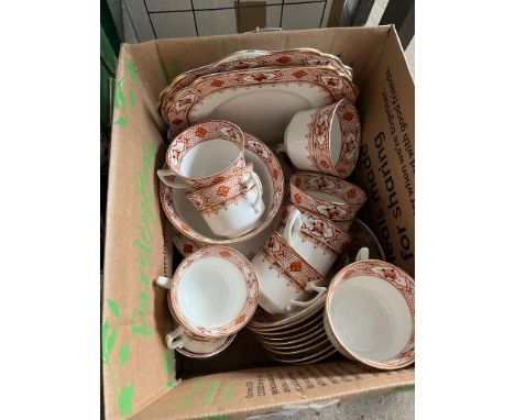 A 34 piece tea service "Gladstone China Made in England" comprised of 10 cups and saucers, 10 side plates, 2 serving plates, 