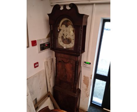 A Georgian mahogany eight day longcase clock with moon dial, weights and pendulum. 