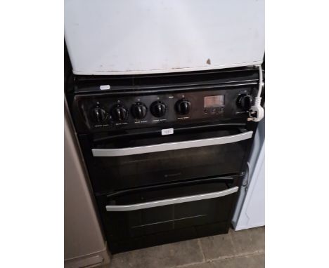 A Hotpoint gas oven with four ring hob. 