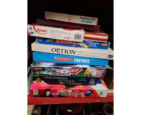 A collection of board games including Scrabble, Monopoly, Dominoes, Backgammon etc. 