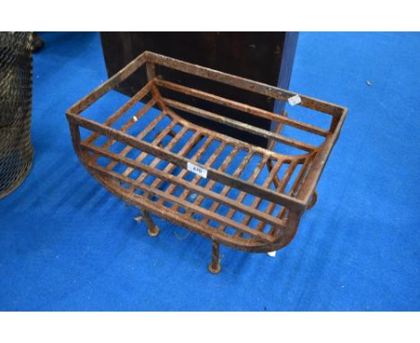 A traditional cast iron dog fire grate of trough form, approx width 45cm and depth 27cm