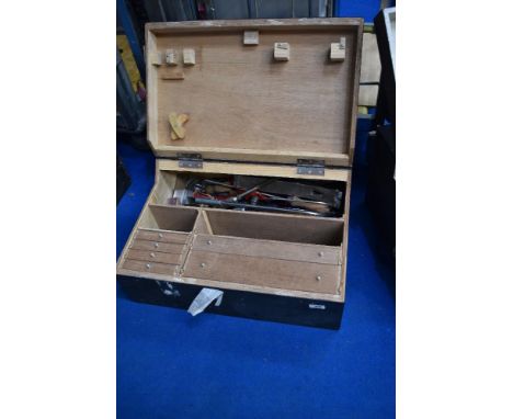 A vintage tool chest and contents