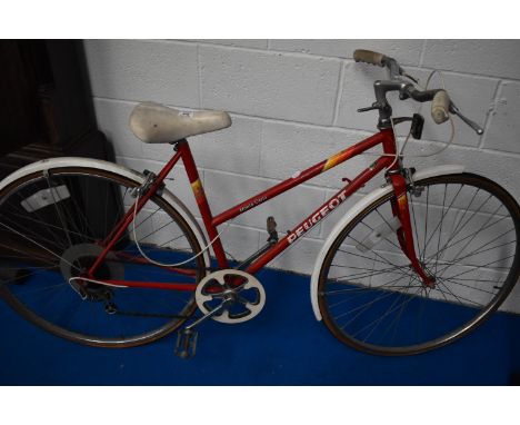 A vintage Peugeot Monte Carlo push bike.
