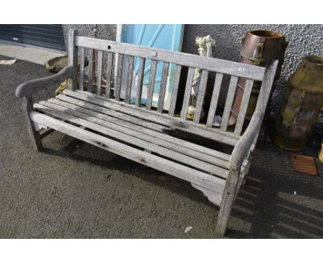 A traditional teak garden bench made from the timber of the yacht Enchantress, approx 168cm