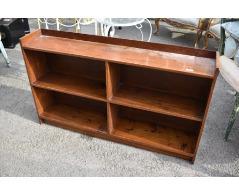 A vintage sapele low bookshelf, dimensions approx. W113 D21 H66cm
