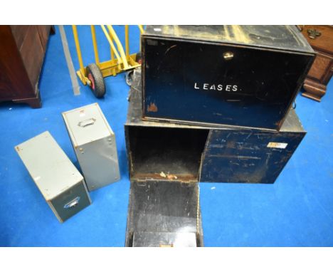 Two large vintage deed boxes with front opening doors and two vintage filing drawers