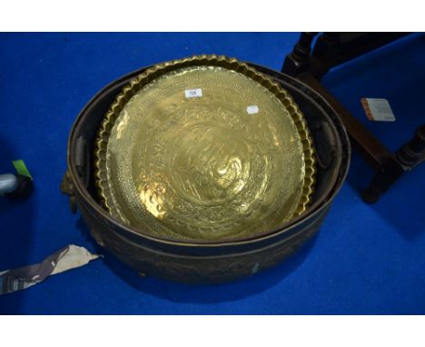 A brass planter and table top