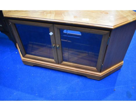 A vintage corner TV cabinet
