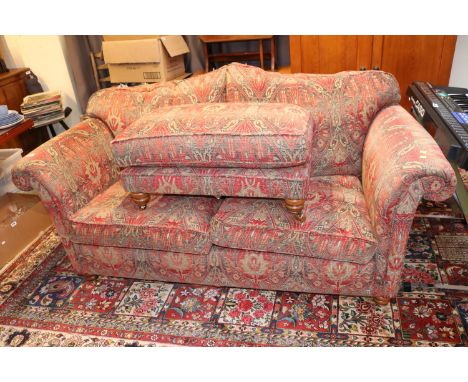 Duresta Red Cottage 2 seater Sofa with front casters and turned legs 