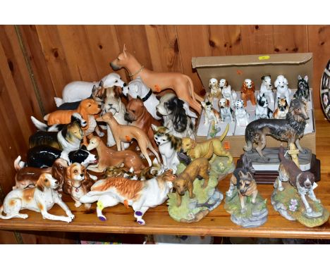 A COLLECTION OF THIRTY SEVEN CERAMIC DOGS AND CATS, to include twelve boxed Bondware dogs, breeds to include Chihuahua, Bosto