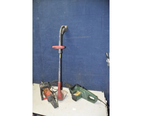 A POWERDEVIL PDG4028A electric chain saw (PAT pass and working) along with a Black and Decker GK430 electric chainsaw (no pow