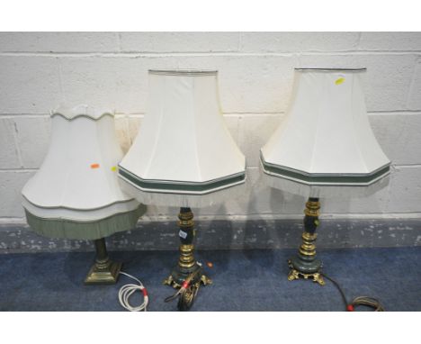 A BRASS CORINTHIAN COLUMN TABLE LAMP, along with a pair of green marble and brass table lamps, both with fabric shades (condi
