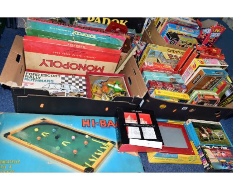 FOUR BOXES OF VINTAGE TOYS, BOARD GAMES AND JIGSAW PUZZLES ETC, to include a boxed Kay Hi-Ball game and Pin Football game, bo