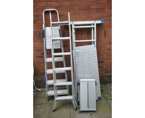 AN ALUMINIUM GARDEN LADDER with platform, along with an extension ladder, step ladders and a folding platform (4)