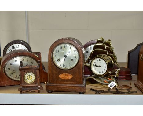 A QUANTITY OF  CLOCKS AND TWO BAROMETERS, comprising two dome shaped clocks with Marquetry, height of both 26cm (one has key 