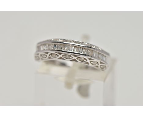 A 9CT WHITE GOLD DIAMOND HALF ETERNITY RING, designed with a central row of rectangular cut diamonds raised between two rows 