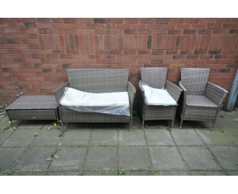 A GARDEN LIFE RATTAN EFFECT PATIO SET, comprising a sofa, two armchairs and a coffee table (4) (condition:-with two seat pads