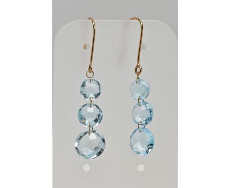 A PAIR OF TOPAZ DROP EARRINGS, each drop earring set with three graduated, circular rose cut light blue topaz, each fitted to