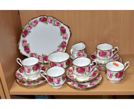 A ROYAL ALBERT 'OLD ENGLISH ROSE' PATTERN TWENTY PIECE TEA SET, comprising a bread and butter plate, a milk jug, a sugar bowl