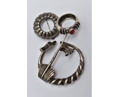 A CLOAK CLIP, BROOCH AND A RING, the white metal cloak clip of a circular form, featuring rope twist detail and floral termin