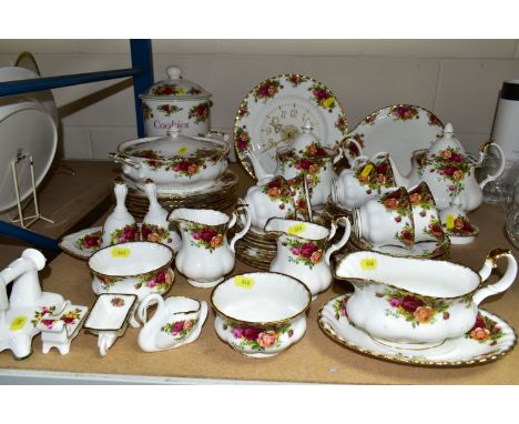 A QUANTITY OF ROYAL ALBERT 'OLD COUNTRY ROSES' CUPS, SAUCERS, TEAPOTS, DINNER PLATES ETC, comprising two teapots (marked as s