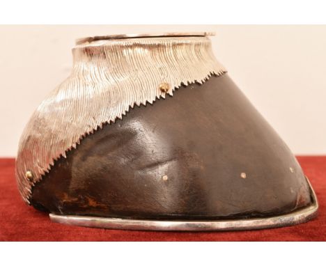 A 19th Century white metal mounted hoof inkwell with horse shoe type fitting to base and decorative covering plate by Rowland