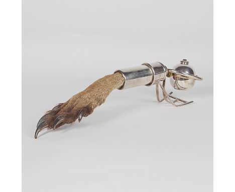 A late 19th Century kangaroo foot and white metal table top cigar lighter. The foot inserted to a circular tube and acting as