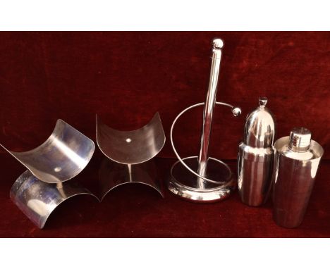 A pair of stainless steel wine racks and two other stainless steel items including a cocktail shaker. H=36cm