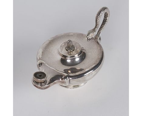 Silver, An English silver table top cigar lighter in the form of a Roman style lamp, with serpent handle and standing on a ci