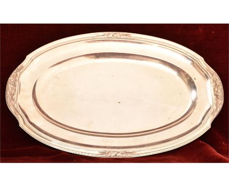 Silver, A French silver serving dish or platter by Tetard Freres, Paris, of circular plain form with foliate designs to the b