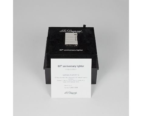 An S.T. Dupont 60th anniversary lighter in presentation box with certificate of authenticity. Model line 2, Number 1285/3000 