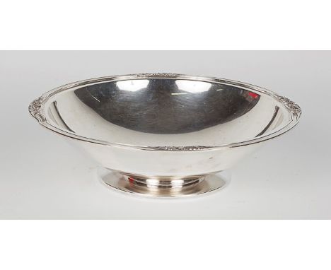 Silver, A French silver serving dish or platter by Tetard Freres, Paris, of circular plain form with foliate designs to the b