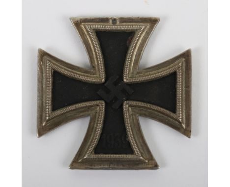 Original WW2 German 1939 Iron Cross 2nd Class: Untouched example with a magnetic central core. Award is missing its ribbon ri