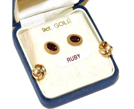 A pair of 9ct gold knot earrings, 0.7g, together with a pair of 9ct gold and ruby earrings.
