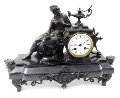 A late 19thC French slate and spelter mantel clock for Henry Marc, Paris, circular enamel dial bearing Roman numerals, eight 