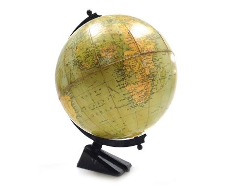 A Philips 8" Challenge globe, raised on a painted lead base.