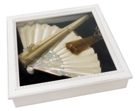 A late 19thC Continental mother of pearl and silk fan, with lace embellishment, together with a Georgian bone and net fan, wi