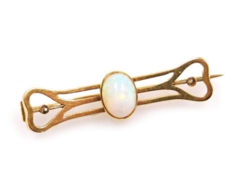An Edwardian Art Nouveau opal brooch, set in yellow metal, stamped 15ct, 4.2g. 