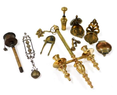 A 19thC Middle Eastern brass betel nut cutter, other brass and copper implements, a hanging double candle lamp, etc.