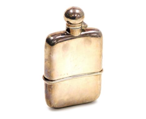 A George V silver hip flask, of plain form with a removable cup, lacking cork stopper, G &amp; J W Hawksley, Sheffield 1919, 